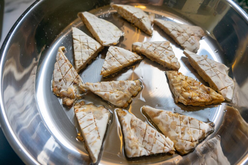 first step to make terik tahu tempe, pan-fry the tempe