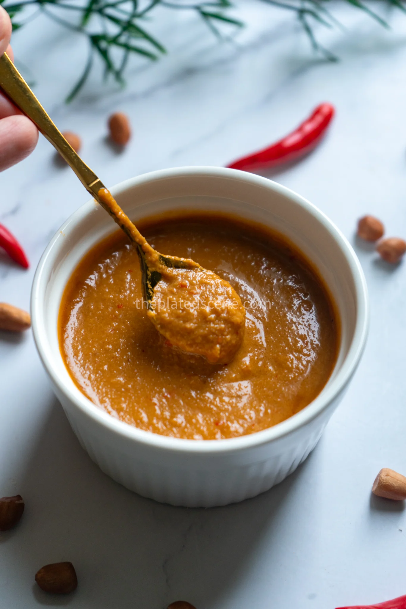Sambel Kacang Recipe: Authentic Indonesian Peanut Sauce 4 Traditional Indonesian sambel kacang in a wooden bowl