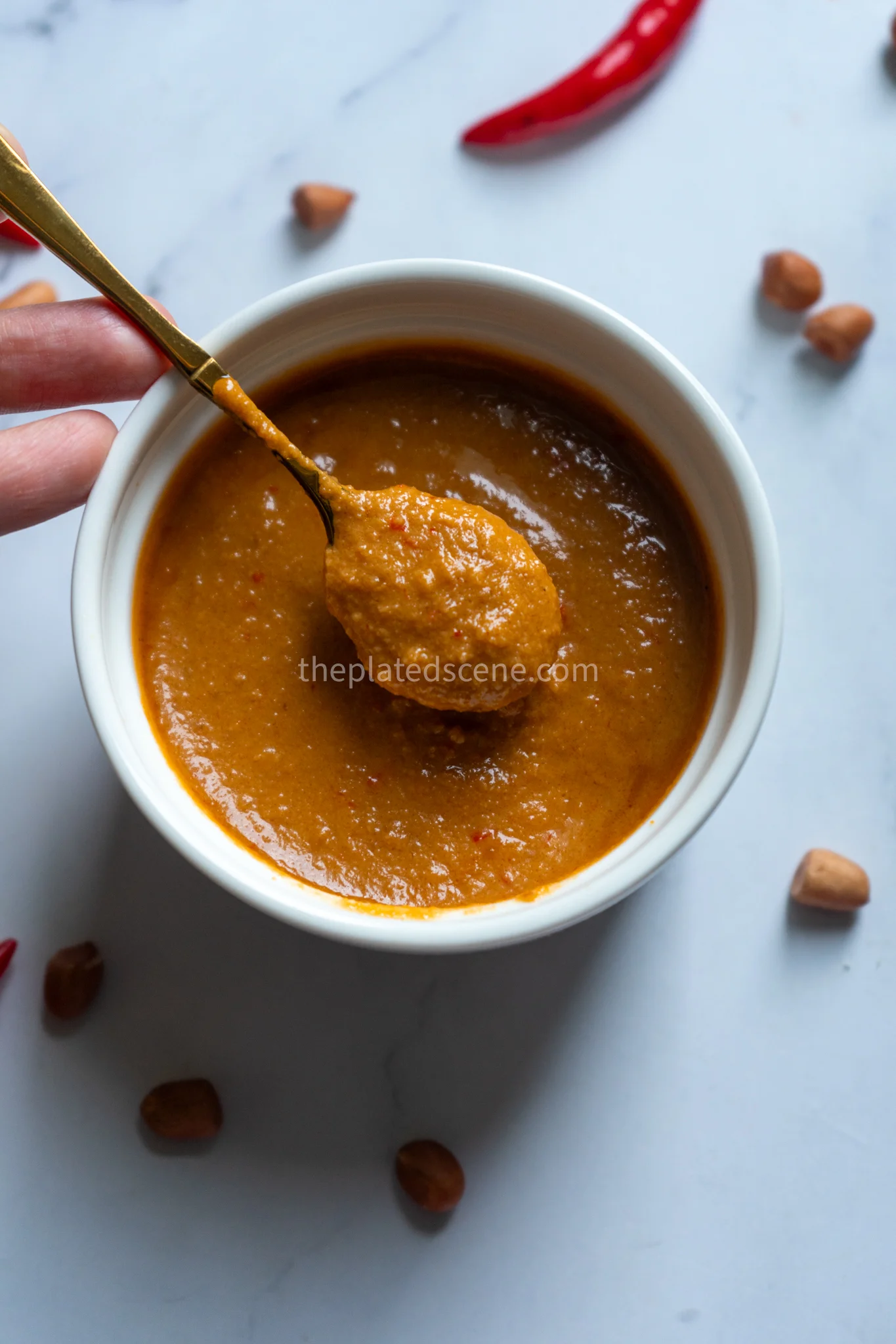 Sambel Kacang Recipe: Authentic Indonesian Peanut Sauce 5 Fresh ingredients for sambel kacang laid out on banana leaf